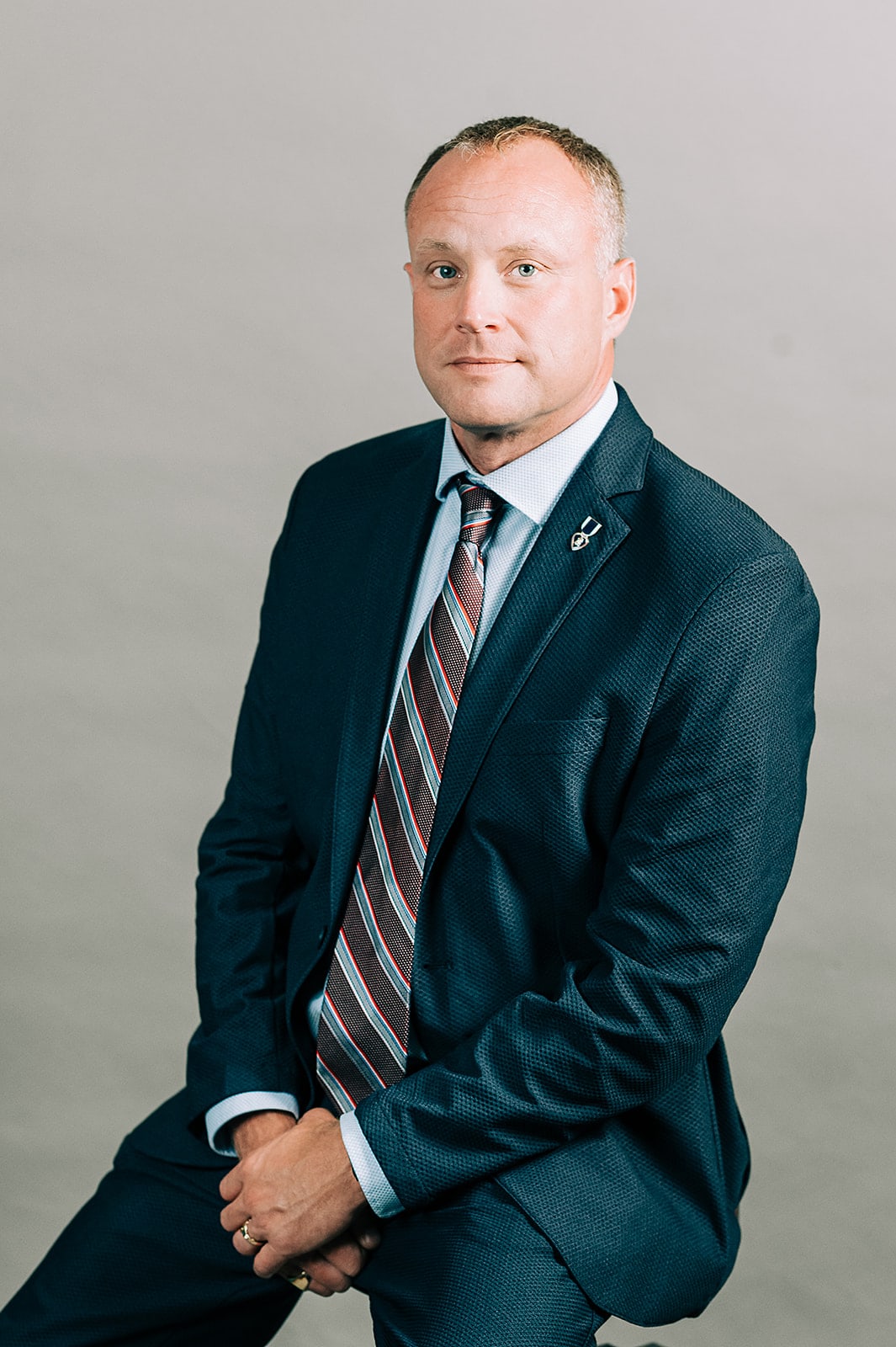 John E. O’Connor seated for a formal portrait